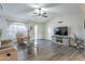 Comfortable living room with vaulted ceilings, neutral tones, and an inviting seating arrangement at 8039 E Madero Ave, Mesa, AZ 85209