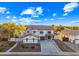 Two-story home with a large driveway and landscaped front yard at 851 E Birchwood Pl, Chandler, AZ 85249