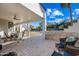 Covered patio with seating area and views of backyard at 851 E Birchwood Pl, Chandler, AZ 85249