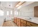 Bathroom with double vanity and bathtub at 8919 N 95Th Ave, Peoria, AZ 85345