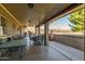 Spacious covered patio, offering ample seating and views of the property at 8919 N 95Th Ave, Peoria, AZ 85345