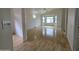 Open living room featuring light wood floors and lots of light at 8944 E Red Mountain Ln, Gold Canyon, AZ 85118