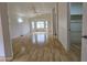 Bright and airy living room featuring light wood floors and a large window at 8944 E Red Mountain Ln, Gold Canyon, AZ 85118