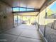 Covered patio with concrete flooring and screened sides at 8944 E Red Mountain Ln, Gold Canyon, AZ 85118