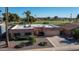 Single-story home aerial view showcasing desert landscaping at 9313 W Briarwood Cir, Sun City, AZ 85351