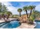 Luxury pool and spa with waterfall feature and mountain views at 9422 N Sunset Rdg, Fountain Hills, AZ 85268