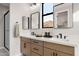 Modern bathroom with double vanity and large walk-in shower at 9516 E Hansen Way, Gold Canyon, AZ 85118