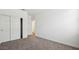 Well-lit bedroom featuring a large closet and neutral walls at 9868 S Caballo Dr, Apache Junction, AZ 85120