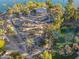 Aerial view of a park with a gazebo, walking paths and a pond at 10632 W Roundelay Cir, Sun City, AZ 85351