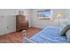 Bedroom featuring a wood dresser, a daybed and a sunlit window at 10632 W Roundelay Cir, Sun City, AZ 85351