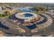 Circular community pool with surrounding parking and landscaping at 10632 W Roundelay Cir, Sun City, AZ 85351