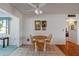 Bright dining area with a wood table and chairs at 10632 W Roundelay Cir, Sun City, AZ 85351