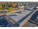 Aerial view of community tennis courts near lake and park at 10632 W Roundelay Cir, Sun City, AZ 85351