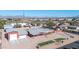 Aerial view of single story home, detached garage, and landscaped yard at 11120 E Grove St, Mesa, AZ 85208