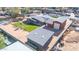 Aerial view showing house, detached garage, and large yard at 11120 E Grove St, Mesa, AZ 85208