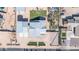 Overhead view of house, detached garage, and a landscaped yard at 11120 E Grove St, Mesa, AZ 85208