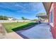 Large backyard with grassy area and covered patio at 11120 E Grove St, Mesa, AZ 85208