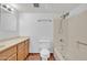 Clean bathroom with tub, shower, and double vanity at 11120 E Grove St, Mesa, AZ 85208