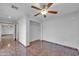 Bedroom with tile floors and a large closet at 11120 E Grove St, Mesa, AZ 85208