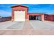 Two-car garage with additional storage area at 11120 E Grove St, Mesa, AZ 85208