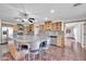 Spacious kitchen with granite countertops, stainless steel appliances, and an island at 11120 E Grove St, Mesa, AZ 85208