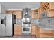 Bright kitchen, granite counters, stainless steel appliances at 11120 E Grove St, Mesa, AZ 85208