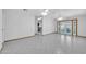 Spacious living area with tiled floors and dual ceiling fans at 11120 E Grove St, Mesa, AZ 85208