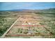 Aerial view of property, showing house and land at 11865 N Allegro Rd, Maricopa, AZ 85139