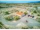Aerial view showing home, parking area, and desert landscape at 11865 N Allegro Rd, Maricopa, AZ 85139