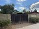 Wooden gate entrance to a private backyard at 1437 E Hall St, Tempe, AZ 85281