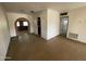 Open living space featuring arched entryways and neutral walls at 1437 E Hall St, Tempe, AZ 85281