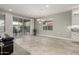 Bright dining room with large windows and a chandelier at 16012 N 109Th Dr, Sun City, AZ 85351