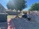 Backyard with gravel, grass, a tree, and patio at 16210 N 32Nd Way, Phoenix, AZ 85032