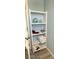 Bathroom with a storage shelving unit for towels and toiletries at 16210 N 32Nd Way, Phoenix, AZ 85032