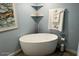 Relaxing bathroom with soaking tub, modern fixtures, and stylish decor at 16210 N 32Nd Way, Phoenix, AZ 85032