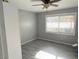 Small bedroom with gray walls and ceiling fan at 16210 N 32Nd Way, Phoenix, AZ 85032