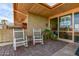 Community entrance with rocking chairs at 16210 N 32Nd Way, Phoenix, AZ 85032