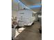 Casita trailer parked under covered carport at 16210 N 32Nd Way, Phoenix, AZ 85032