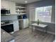 Updated kitchen with white cabinets and granite countertops at 16210 N 32Nd Way, Phoenix, AZ 85032