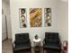 Office waiting area with black chairs and art at 16210 N 32Nd Way, Phoenix, AZ 85032