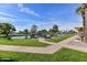 Serene pond with walking path and benches at 16210 N 32Nd Way, Phoenix, AZ 85032