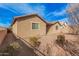 Spacious backyard with gravel and desert landscaping at 1727 N 213Th Dr, Buckeye, AZ 85396
