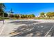 Community basketball court with lines and hoop at 1727 N 213Th Dr, Buckeye, AZ 85396