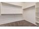 Spacious closet with shelves, hanging rods and additional shelving at 1727 N 213Th Dr, Buckeye, AZ 85396