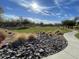 Scenic park with walking paths, grassy areas, and a relaxing atmosphere at 1727 N 213Th Dr, Buckeye, AZ 85396