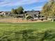 Modern playground with shade structure at 1727 N 213Th Dr, Buckeye, AZ 85396