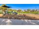 playground with swings and play structures at 1727 N 213Th Dr, Buckeye, AZ 85396