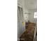 Laundry room with built-in shelving and vinyl flooring at 18002 N 20Th N Pl, Phoenix, AZ 85022