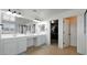Large bathroom with double vanity, walk-in shower, and separate tub at 18225 W Foothill Dr, Surprise, AZ 85387