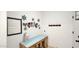 Entryway with decorative wall art and storage bench at 18225 W Foothill Dr, Surprise, AZ 85387